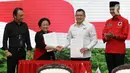 Adapun Megawati didampingi oleh kedua anaknya sekaligus Ketua DPP PDIP Puan Maharani dan Prananda Prabowo. (Liputan6.com/Herman Zakharia)