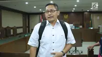 Terpidana kasus korupsi Pembangunan P3SON Hambalang, Anas Urbaningrum usai menjalani sidang lanjutan PK di Pengadilan Negeri Jakarta Pusat, Kamis (12/7). Sidang beragenda pembacaan kesimpulan pemohon Peninjauan Kembali. (Liputan6.com/Helmi Fithriansyah)