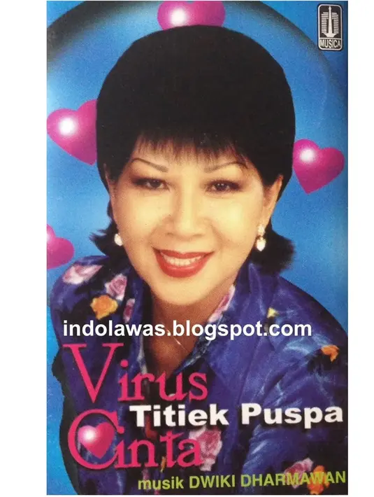 Ini adalah potret lawas penampilan Titiek Puspa di cover album Virus Cinta tahun 1997. Kala itu, usianya menginjak kepala enam. Bisa dibilang sudah tak lagi muda, namun pesonanya seakan tak pernah memudar. Ia selalu segar meski usianya terus bertambah. (Liputan6.com/IG/@titiekpuspa_official)