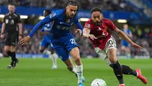 Duel perebutan bola Matheus Cunha dan Malo Gusto dalam laga Liga Inggris antara Chelsea vs Manchester United di Stamford Bridge, 19 April 2026. (AP Photo/Kirsty Wigglesworth)