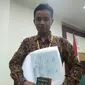 Ihsan Hadi di Pengadilan Negeri Tangerang setelah hakim memutuskannya berganti nama dari kentut (Pramita Tristiawati)