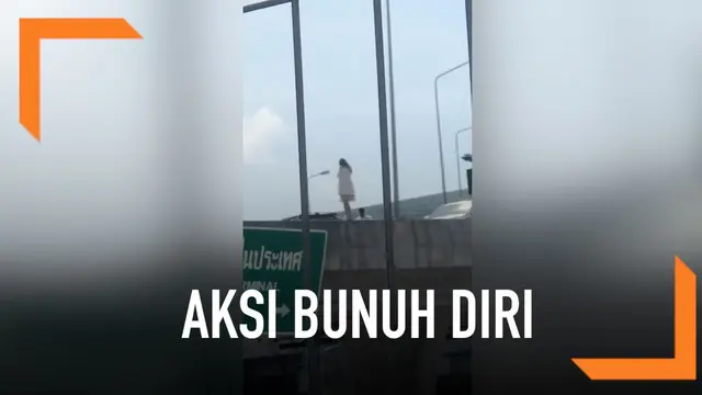 Seorang turis wanita mencoba bunuh diri dengan melompat di jembatan layang. Namun, secara tiba-tiba petugas berhasil menggagalkan aksi bunuh diri ini.