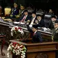 Presiden Terpilih Joko Widodo mengepalkan tangannya usai membacakan pidatonya saat pelantikan di Senayan, Jakarta, Senin (20/10/2014) (Liputan6.com/Andrian M Tunay)