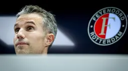 Van Persie menggantikan Pascal Bosschaart sebagai pelatih interim Feyenoord. Eks penyerang Arsenal tersebut menandatangani kesepakatan kontrak hingga Juni 2027. (AFP/ANP/Koen van Weel)
