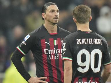 AC Milan membuang kesempatan untuk menyodok ke posisi tiga besar klasemen sementara Liga Italia 2022/2023 setelah hanya bermian imbang 1-1 menghadapi tamunya Salernitana pada laga pekan ke-26 di San Siro Stadium, Milan, Selasa (14/3/2023) dini hari WIB. Rossoneri unggul terlebih dahulu pada masa injury time babak pertama lewat sundulan Olivier Giroud, sementara gol balasan Salernitana dihasilkan Boulaye Dia pada menit ke-61. Dengan tambahan satu poin, AC Milan sementara mengoleksi 48 poin, gagal menggusur Lazio dari peringkat ketiga yang telah mengoleksi 49 poin. Andaikan menang, AC Milan bahkan bisa menyamai perolehan poin Inter Milan di posisi runner-up dengan 50 poin. (AP Photo/Luca Bruno)
