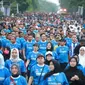 Ribuan warga Pekanbaru bersama Polda Riau dalam Bhayangkara Fun Walk di car free day. (Liputan6.com/M Syukur)