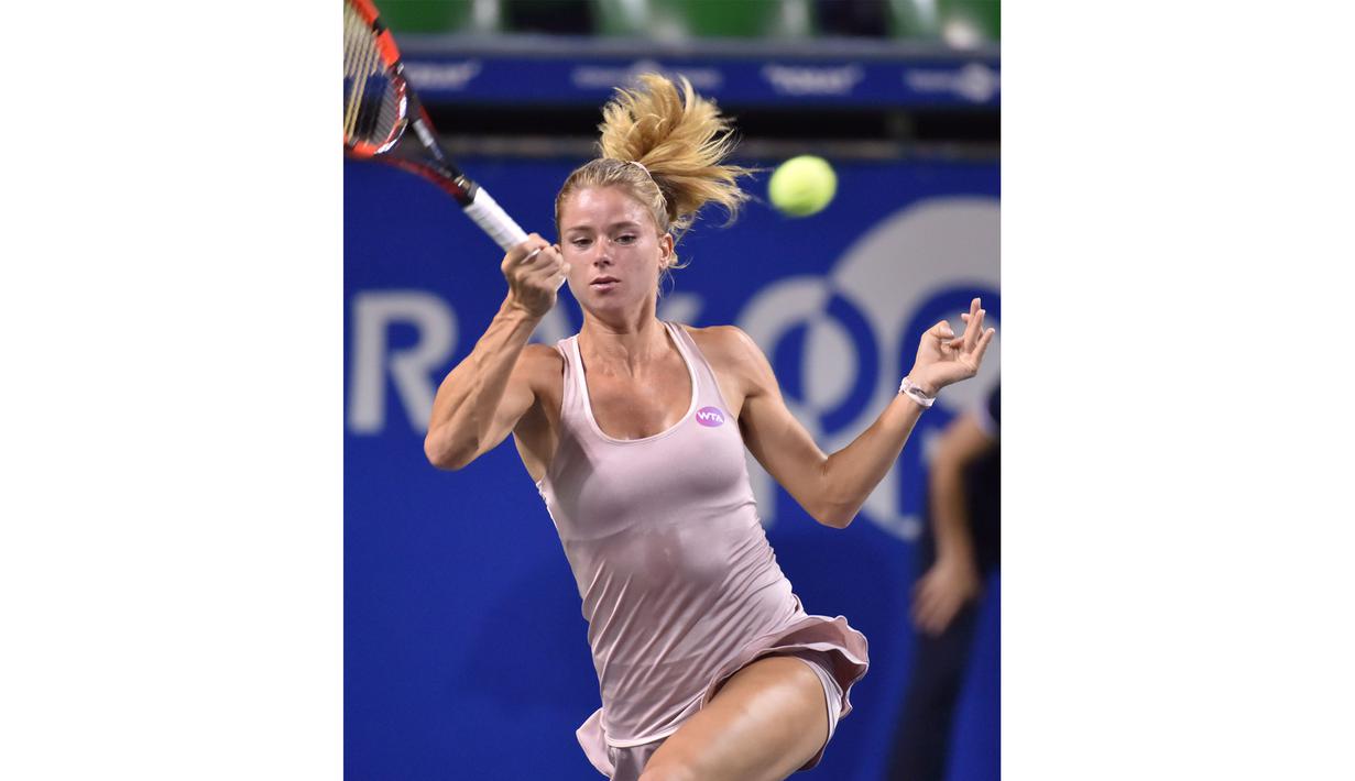  Camila Giorgi menjadi salah satu tumpuan tenis putri Italia setelah berakhirnya era Flavia Penneta dan Sara Errani. (AFP/Kazuhiro Nogi)