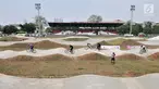Pembalap bersaing dalam kejuaraan sepeda BMX Bearco Fest 2019 di Jakarta International BMX Track, Pulomas, Jakarta, Minggu (25/8/2019). Bearco Fest 2019 diikuti oleh pembalap sepeda profesional nasional yang terbagi dalam beberapa kategori. (merdeka.com/Iqbal Nugroho)