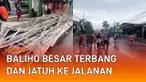 Sebuah insiden baliho berukuran besar terbang dan jatuh ke jalan mengundang perhatian.