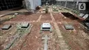 Kondisi sejumlah makam yang jenazahnya telah dipindahkan ke makam bersusun atau kolumbarium di kompleks pemakaman Paroki Gereja St Servatius, Kampung Sawah, Bekasi, Jawa Barat, Kamis (26/12/2019). (merdeka.com/Iqbal Nugroho)