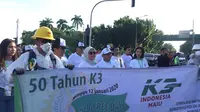 Perayaan emas Keselamatan dan Kesehatan Kerja (K3) di Pintu Barat Daya Monas, Jakarta Pusat, Minggu (12/1/2020).Liputan6.com