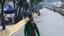 Suasana Jalan Jatibaru di kawasan Tanah Abang, Jakarta, Selasa (19/6). Hingga H+4 Lebaran 2018 belum terlihat aktivitas pedagang kaki lima yang biasa berjualan di salah satu ruas jalan Jatibaru. (Liputan6.com/Helmi Fithriansyah)