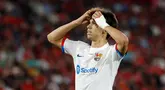 Pemain Barcelona, Joao Felix, tampak kecewa setelah bermain imbang melawan Real Mallorca pada laga pekan ke-7 La Liga 2023/2024, di Stadion Mallorca Son Moix Rabu (27/9/2023). Kedua tim bermain sama kuat 2-2. (AFP/Jaime Reina)