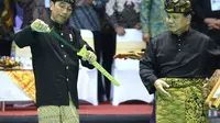 Presiden Joko Widodo menerima gelar Pendekar Utama Pencak Silat Indonesia. (Liputan6.com/Ahmad Romadoni)