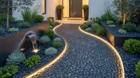 7 Desain Area Masuk Rumah dengan Jalur Batu Koral Hitam, Sentuhan Elegan dan Fungsional
