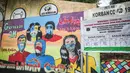 Lukisan mural melawan virus corona COVID-19 di Kawasan Cikokol, Cawang, Jakarta, Minggu (4/10/2020).  Mural masih dianggap menjadi sarana edukasi kesehatan yang tepat bagi warga untuk menjaga diri dari penularan virus Covid 19. (Liputan6.com/Faizal Fanani)