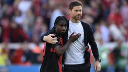 Jeremie Frimpong didatangkan Bayer Leverkusen pada tengah musim 2020/2021 dari klub Skotlandia, Glasgow Celtic dengan nilai transfer hanya 11 juta euro. Sebelum membela Glasgow Celtic, Jeremie Frimpong merupakan pemain didikan Akademi Manchester City yang belum sempat dipromosikan ke tim senior. Saat membela tim Man City U-23 ia memutuskan pindah ke Glasgow Celtic pada awal musim 2019/2020. Di Bundesliga musim 2023/2024 ia telah tampil dalam 19 laga dengan torehan 5 gol dan 7 assist. (AFP/Ina Fassbender)