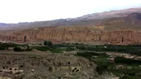 Reruntuhan Shahr-i Ghulghulah atau City of Scream dengan pemandangan dua patung Buddha yang sudah handur di Lembah Bamiyan, Afganistan. (Foto : Muhammadi Reza Ghulam/UNESCO Kabul)