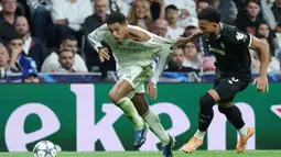 Laga antara Real Madrid vs Juventus berlangsung dalam tempo tinggi sejak menit awal pertandingan. (Thomas COEX/AFP)