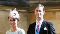 Pippa Middleton dan James Matthews saat menghadiri upacara pernikahan Pangeran Harry dan Meghan Markle di St. George's Chapel, Windsor Castle, Windsor, dekat London, Inggris, Sabtu (19/5). (Chris Jackson/pool photo via AP)