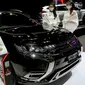 Distributor resmi MMKSI memperkenalkan produk dan layanan Mitsubishi Motors di Indonesia pada mobil seperti New Pajero Sport, Xpander dan Xpander Cross, Eclipse Cross, dan Outlander PHEV pada IIMS hybrid 2021. (Liputan6.com/Pool/Mitsubishi)