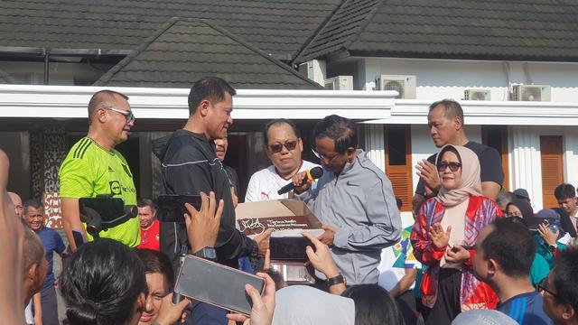 Momen pelepasan Mahfud Md sebagai Menko Polhukam di Kementerian Politik, Hukum, dan Keamanan, Jumat (2/2/2024).