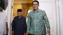 Gubernur Jawa Barat Ridwan Kamil tersenyum saat mengunjungi kediaman calon wakil presiden nomor urut 01 Ma'ruf Amin di Jalan Situbondo, Menteng, Jakarta Pusat, Selasa (12/2). (Liputan6.com/Immanuel Antonius)