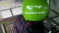 helm unik buatan agung budi triyono berbentuk tabung gas