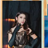 Mengenakan busana dari Ernesto Abram, Tiara nampak berkilau dengan sabrina dress berwarna cooper. Dipadukan dengan sarung tangan hitam, memantapkan penampilan Tiara yang bak Diva.