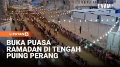 Ratusan warga berkumpul di Khan Younis, Gaza selatan, pada Rabu untuk mengikuti iftar atau buka puasa bersama di hari pertama Ramadan. Meja-meja panjang berjejer di tengah kawasan yang masih dipenuhi puing bangunan hancur akibat perang.