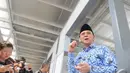Plt Gubernur DKI Jakarta Basuki Tjahaja Purnama (Ahok) blusukan ke areal PKL di IRTI Monas, Jakarta, Senin (10/11/2014) (Liputan6.com/Herman Zakharia)