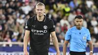 Ekspresi striker Manchester City asal Norwegia, Erling Haaland, saat laga melawan AS Monaco pada matchday 2 league phase Liga Champions 2025/2026 di Stade Louis II, Kamis (2/10/2025) dini hari WIB. (AFP/Frederic Dides)