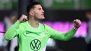 Jonas Wind tampil cemerlang meski klubnya, Wolfsburg memiliki performa yang kurang baik pada musim ini. Wind masuk ke dalam lima pencetak gol terbanyak Bundesliga 2023/2024. Ia sukses melesatkan 9 gol dalam 13 penampilan hingga pekan ke-13 ini. Sementara itu, Wolfburg bertengger di posisi ke-11 dengan raihan 16. (AFP/Ronny Hartmann)