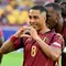 Gelandang Timnas Belgia, Youri Tielemans, merayakan gol yang dicetaknya ke gawang Rumania dalam laga Grup E Euro 2024 di Cologne Stadium, Minggu (23/6/2024) dini hari WIB. Belgia menang 2-0 atas Rumania dalam pertandingan ini. (Alberto PIZZOLI / AFP)