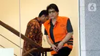 Mantan Kepala Dinas Pengelolaan Keuangan dan Aset Daerah Kota Bandung Herry Nurhayat tiba di Gedung KPK, Jakarta, Rabu (12/2/2020). Herry akan diperiksa sebagai tersangka kasus dugaan korupsi pengadaan tanah untuk RTH di lingkungan Pemkot Bandung tahun 2012-2013. (merdeka.com/Dwi Narwoko)