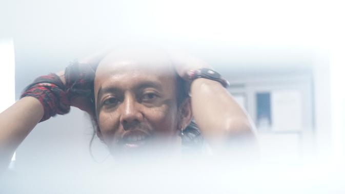 Arris Zulfikar atau Jamal dalam perannya di sinetron 'Preman Pensiun' menjalani pemeriksaan medis di Kantor BNN Provinsi Jawa Barat, Senin (22/7/2019). (Liputan6.com/Huyogo Simbolon)