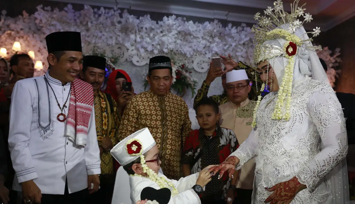 Daus Mini danSelviana Hana Wijaya