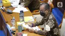 Menteri Perindustrian Agus Gumiwang Kartasasmita menyampaikan paparannya saat rapat kerja dengan Komisi VII DPR di Kompleks Parlemen, Senayan, Jakarta, Rabu (2/2/2022). Rapat membahas program Kemenperin tahun 2022 serta evaluasi kinerja Kemenperin tahun 2021. (Liputan6.com/Angga Yuniar)