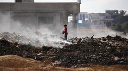 Dalam pernyataannya, pada 4 Juni 2025, Abu Khalaf mengatakan anak-anak menghadapi tantangan besar di tengah perang yang terus berlangsung. (Eyad BABA/AFP)