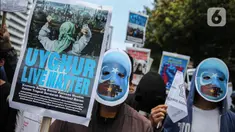 Sejumlah massa yang tergabung dalam Aliansi Mahasiswa Islam (AMI) melakukan aksi di Kantor Perwakilan PBB, Jakarta, Rabu (5/4/2023).  (Liputan6.com/Faizal Fanani)