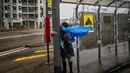 Sebelumnya, Hong Kong menetapkan Level 8 dari 10 kemungkinan tingkatan dari peringatan cuaca sebagai persiapan menghadapi Topan Super Ragasa. (Leung Man Hei/AFP)