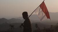Ilustrasi bendera Indonesia, nasionalisme. (Photo by Rizky Rahmat Hidayat on Unsplash)