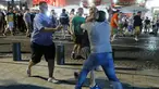  Sejumlah Suporter timnas Inggris dan Rusia serta pemuda lokal terlibat bentrok saat pembukaan Euro 2016  di kawasan bar Marseille, Prancis (10/6). Bentrokan mengakibatkan kerusakan sejumlah fasilitas bar dan jalan di Vieux Port. (REUTERS / Eddie Keogh)
