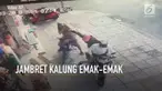 Kawanan jambret menarik kalung dari seorang wanita yang sedang berada di pinggir jalan.