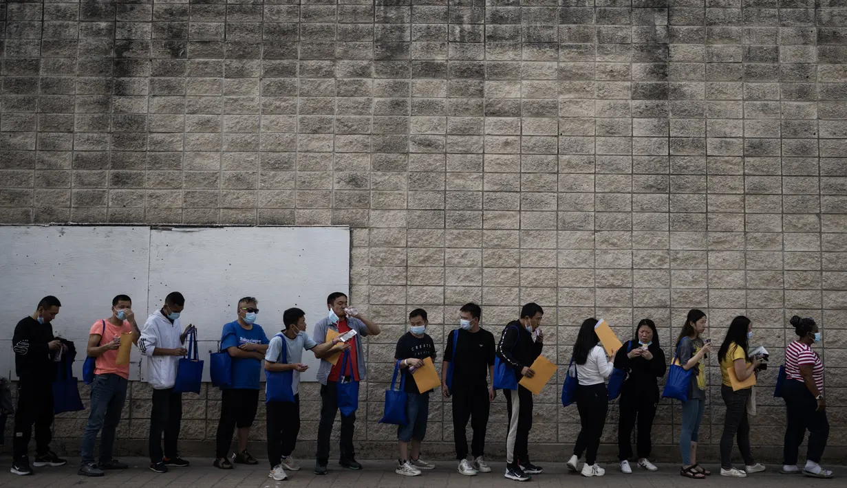 Para migran memutuskan untuk menyeberang karena ketidakpastian tentang apa yang akan terjadi setelah Title 42 dicabut. (ANDREW CABALLERO-REYNOLDS / AFP)