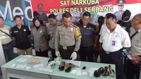 Dua perempuan asal Aceh terpaksa berurusan dengan hukum setelah kedapatan membawa narkotika jenis sabu di Bandara Kualanamu, Kabupaten Deli Serdang, Sumatera Utara. (Reza Efendi/ Liputan6.com)