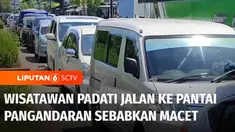 Pemudik memadati Pantai Pangandaran, Jawa Barat, di masa libur lebaran. Akibatnya, lalu lintas di gerbang masuk pantai macet, sehingga polisi memberlakukan sistem buka tutup.