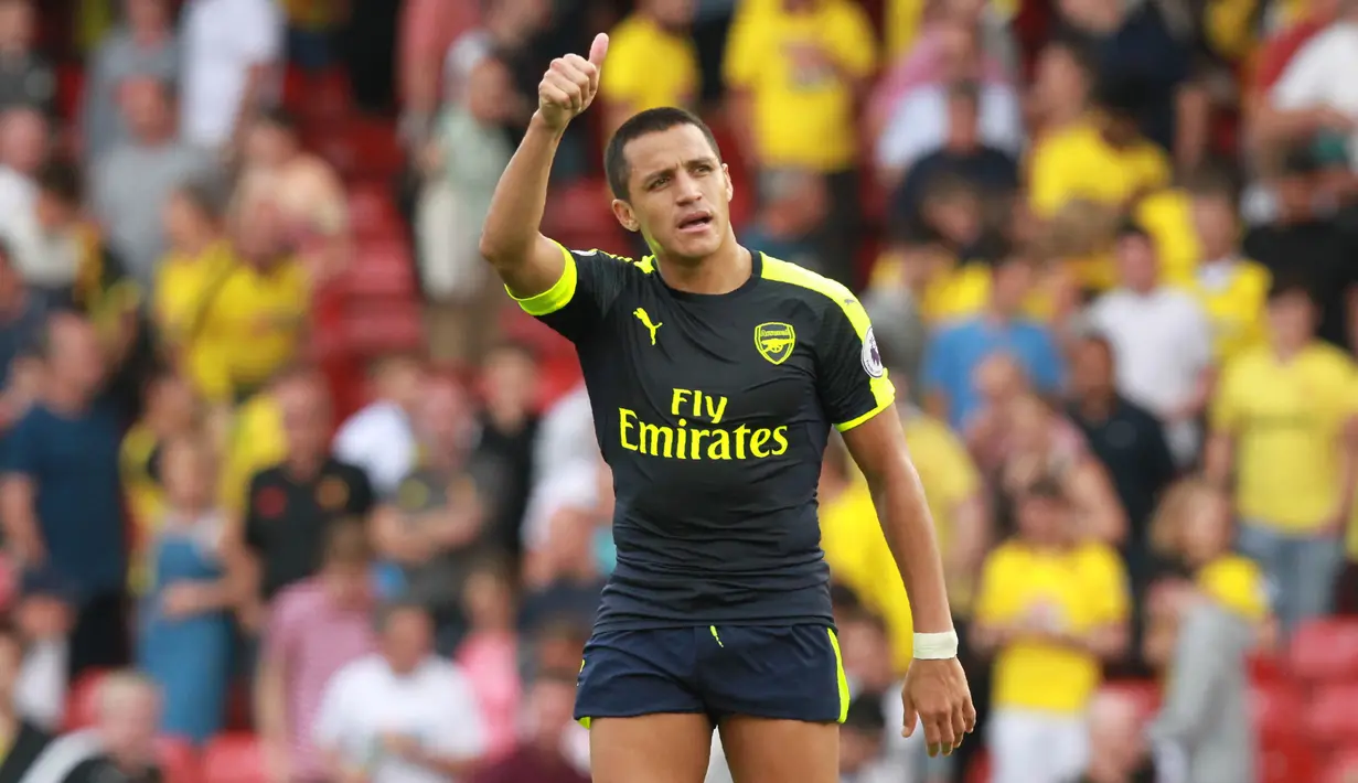 Pemain Arsenal, Alexis Sanchez mencetak satu gol saat Arsenal dijamu Watford pada lanjutan liga Inggris pekan ke-3 di Vicarage Road Stadium (27/8/2016). Arsenal menang 3-0.(AFP/Sean Dempsey)