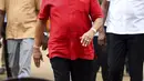 Presiden Sri Lanka Gotabaya Rajapaksa meninggalkan tempat pemungutan suara usai memberikan suaranya di Kolombo, Sri Lanka, Rabu (5/8/2020). Sri Lanka menggelar pemilihan parlemen di tengah pandemi COVID-19. (Ishara S. KODIKARA/AFP)