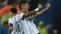 Marcos Rojo. Bek berusia 30 tahun ini tampil cemerlang bersama Timnas Argentina di Piala Dunia 2014 Brasil. Melaju hingga final dan kalah 0-1 dari Jerman melalui babak extra time, ia tampil dalam 6 laga, termasuk partai final dengan torehan 1 gol dan 1 assist. (AFP/Adrian Dennis)